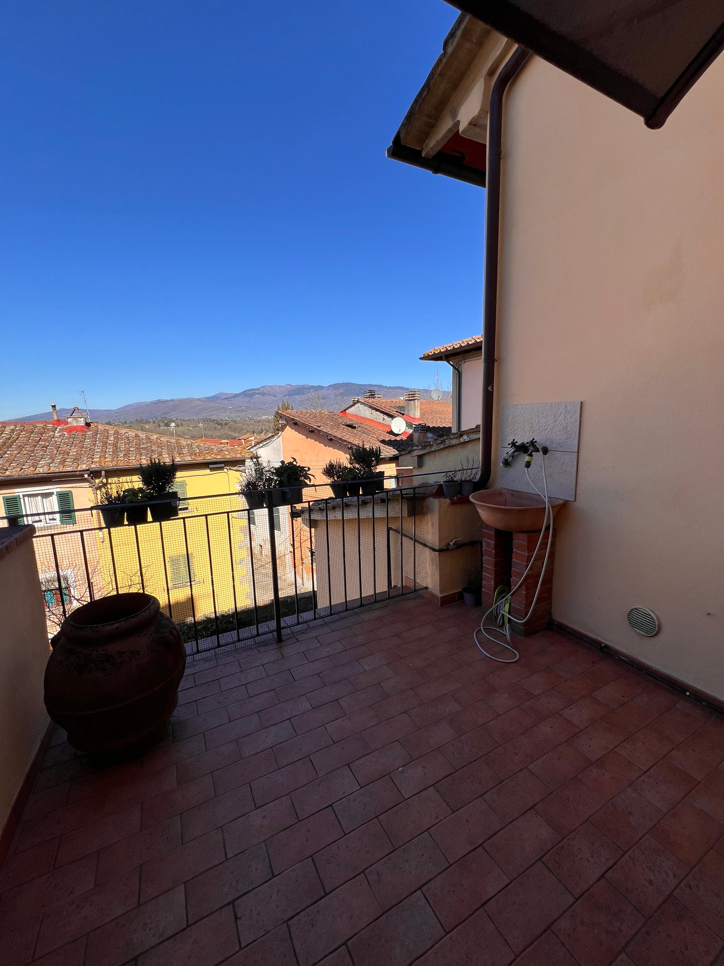 Apartment in a village with two large terraces